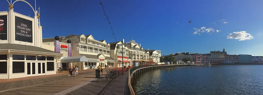Disney's BoardWalk promenade along Crescent Lake at sunset