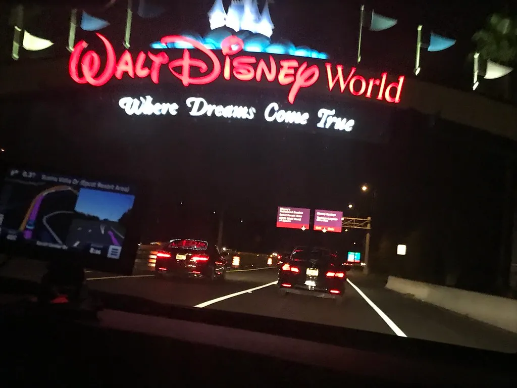 The Walt Disney World entrance arch reading "Where Dreams Come True"