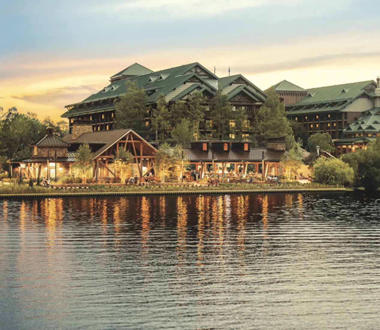 a group of buildings next to a body of water