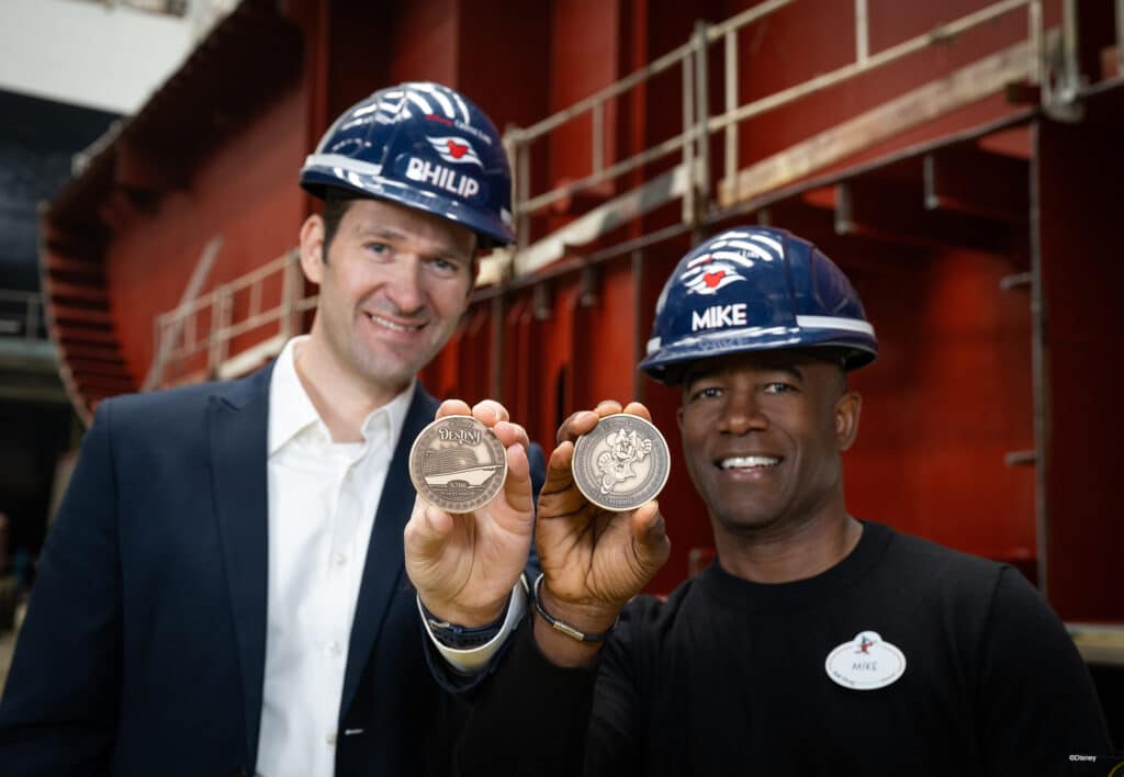 men holding coins in their hands