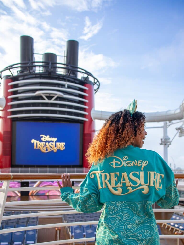 a woman in a garment on a cruise ship